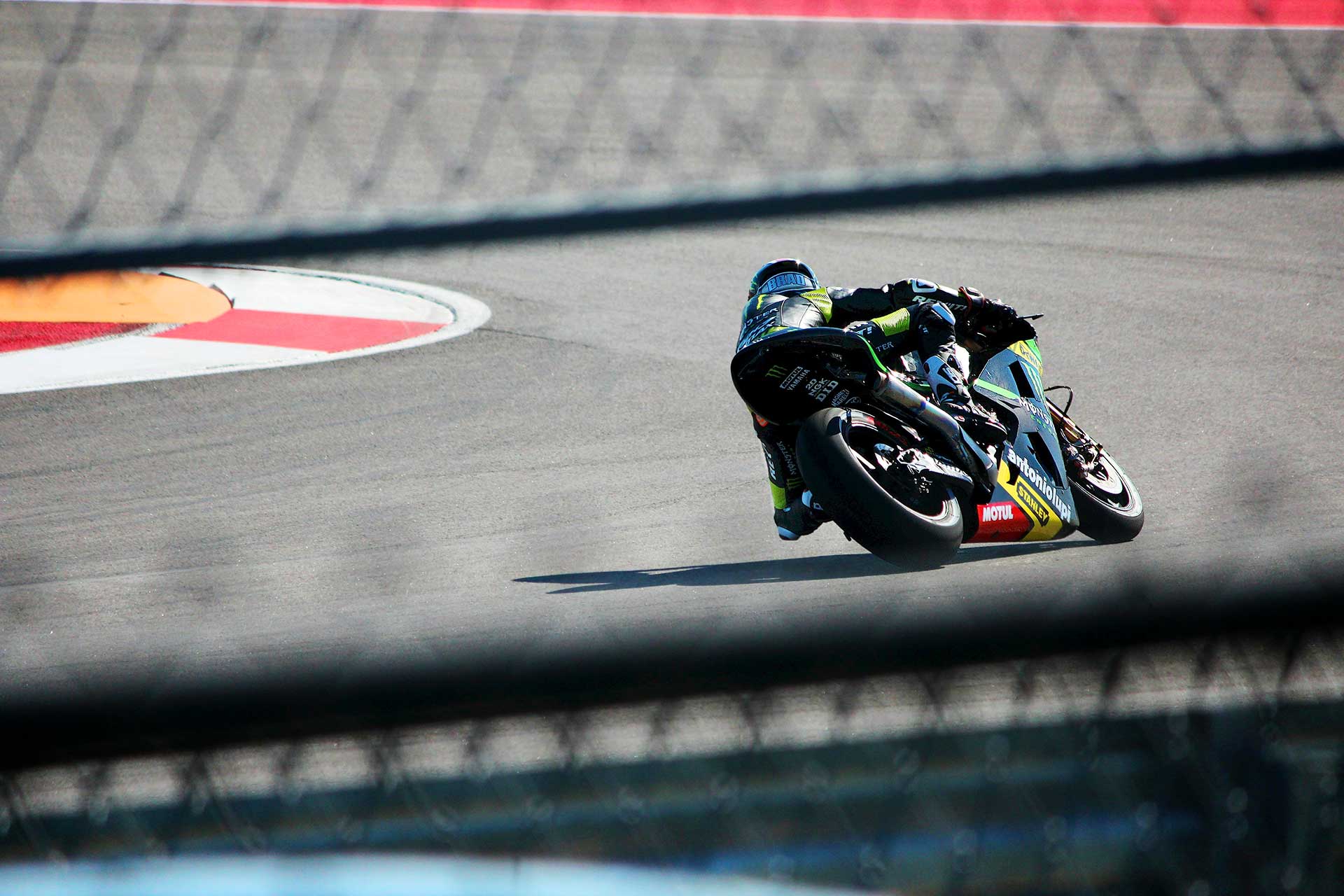 Web Coder working on laptop computer in office